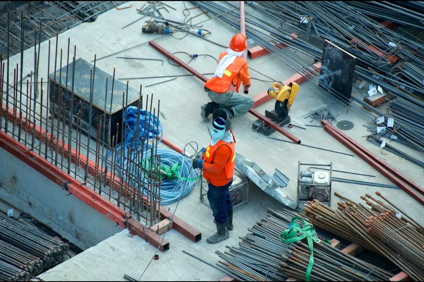 Workers with tools on a construction site